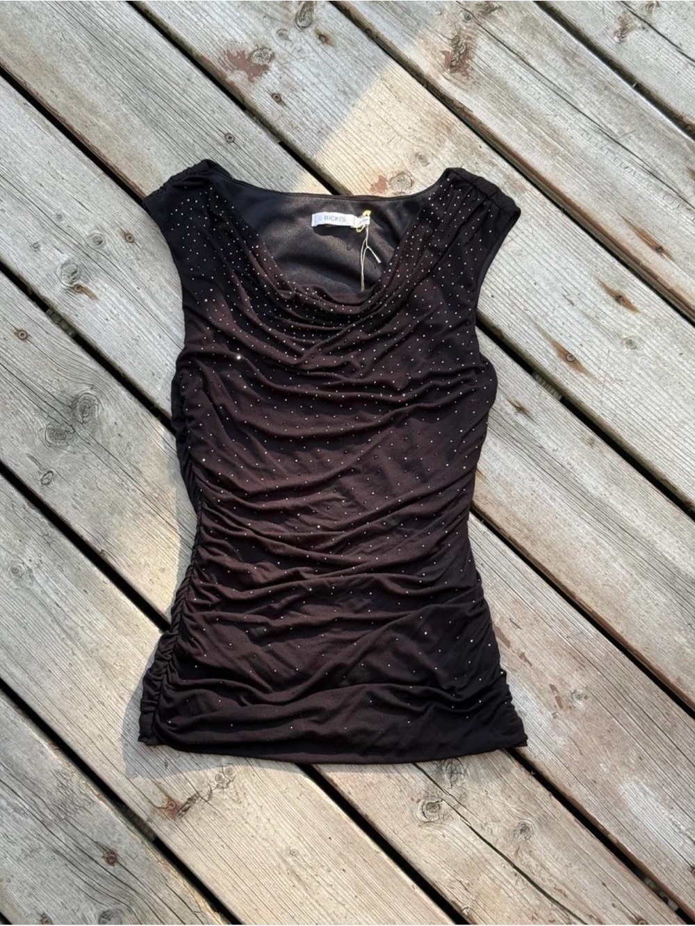 Ricki's fitted black cowl neck top with silver and black rhinestones